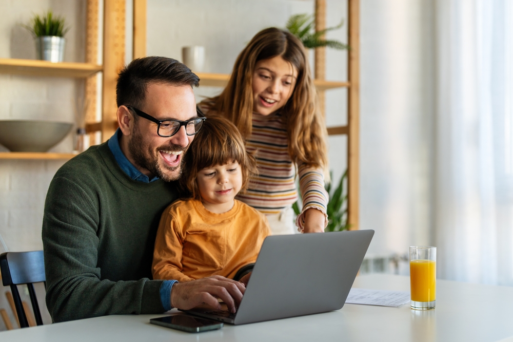 Happy,Family,With,Kids,Having,Fun,Using,Laptop,Together,,Parent Happy,Family,With,Kids,Having,Fun,Using,Laptop,Together,,Parent